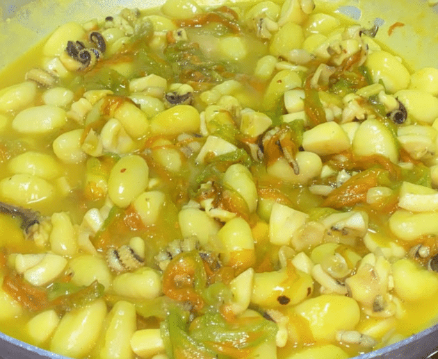 Gnocchi seppia, fiori di zucca e zafferano