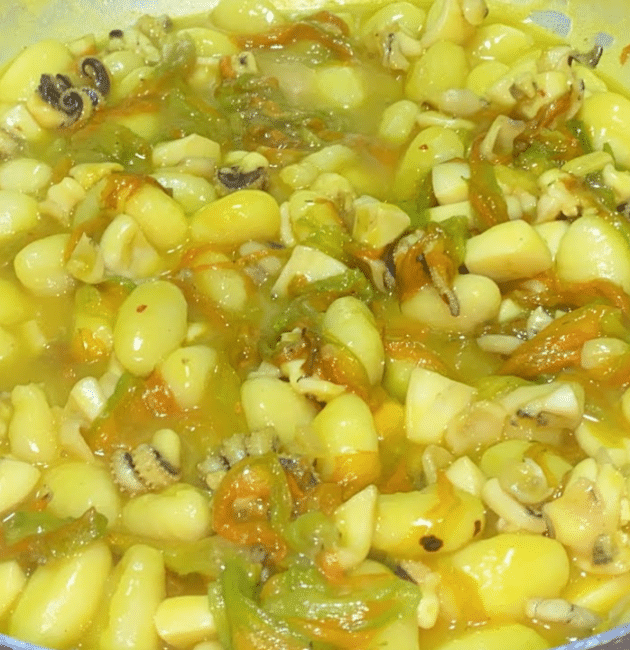 Gnocchi seppia, fiori di zucca e zafferano