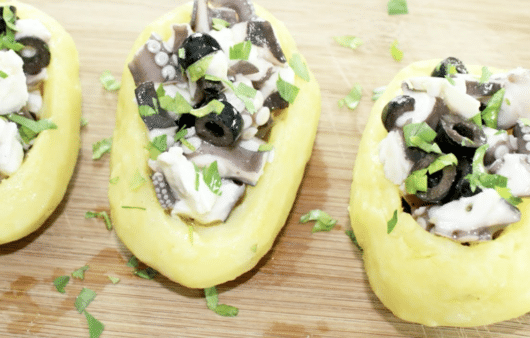 Patate ripiene di polpo all'insalata