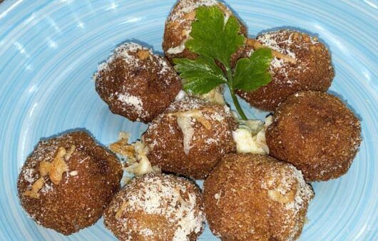 Bocconcini di salsiccia impanati con asiago filante