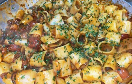 Calamarata con polpo e pomodorini