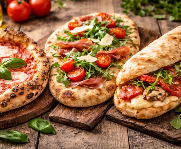 Pizza, pinsa e panuozzo sembrano simili, ma non lo sono. Cambiano impasto, lavorazione e consistenza: ecco le differenze.
